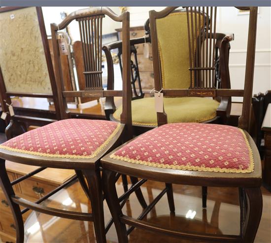 An Edwardian mahogany tub shaped armchair and a pair of inlaid bedroom drawers